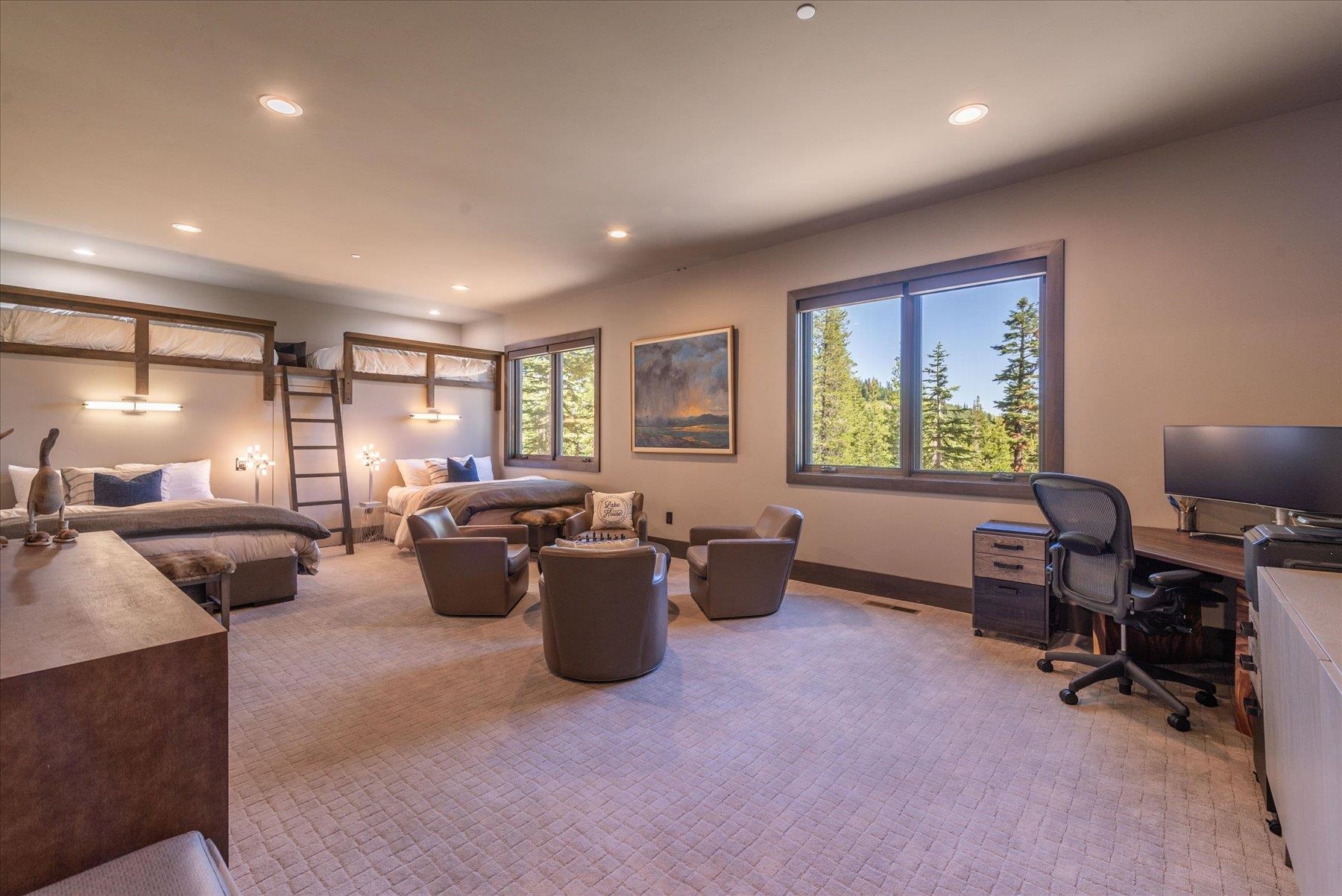 15339 Ski Slope Way Truckee, CA 96161 - Photo 22 of 28 a living room with furniture a window and gym equipment