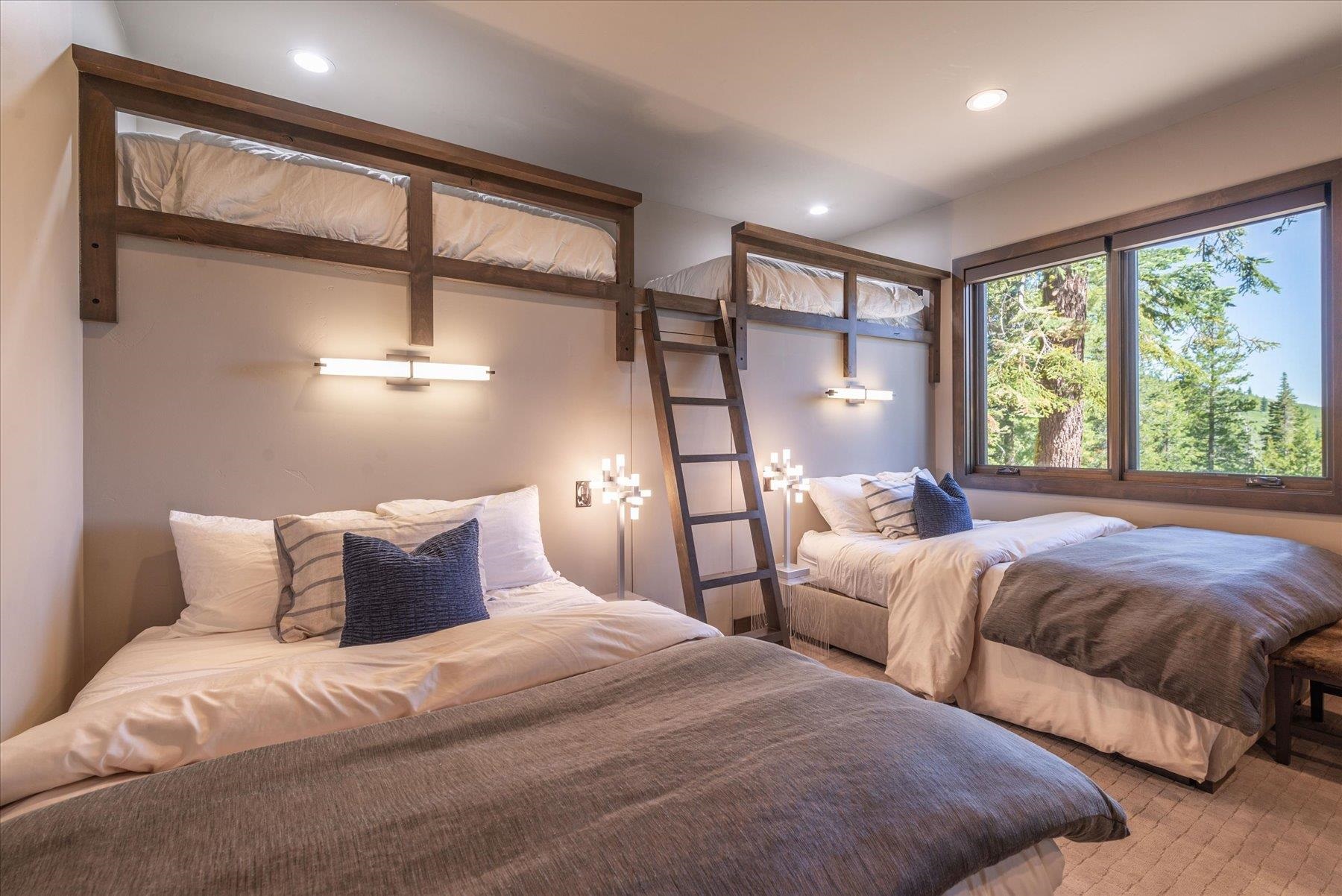 15339 Ski Slope Way Truckee, CA 96161 - Photo 23 of 28 a bedroom with two beds and a large window