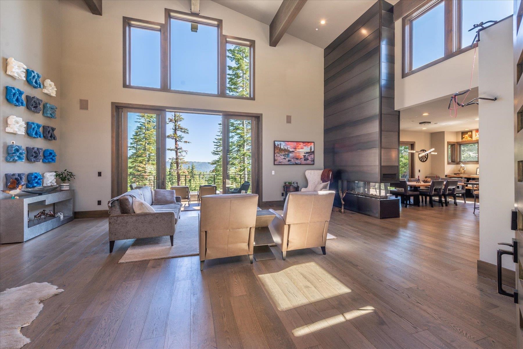 15339 Ski Slope Way Truckee, CA 96161 - Photo 3 of 28 a living room with fireplace furniture and a large window