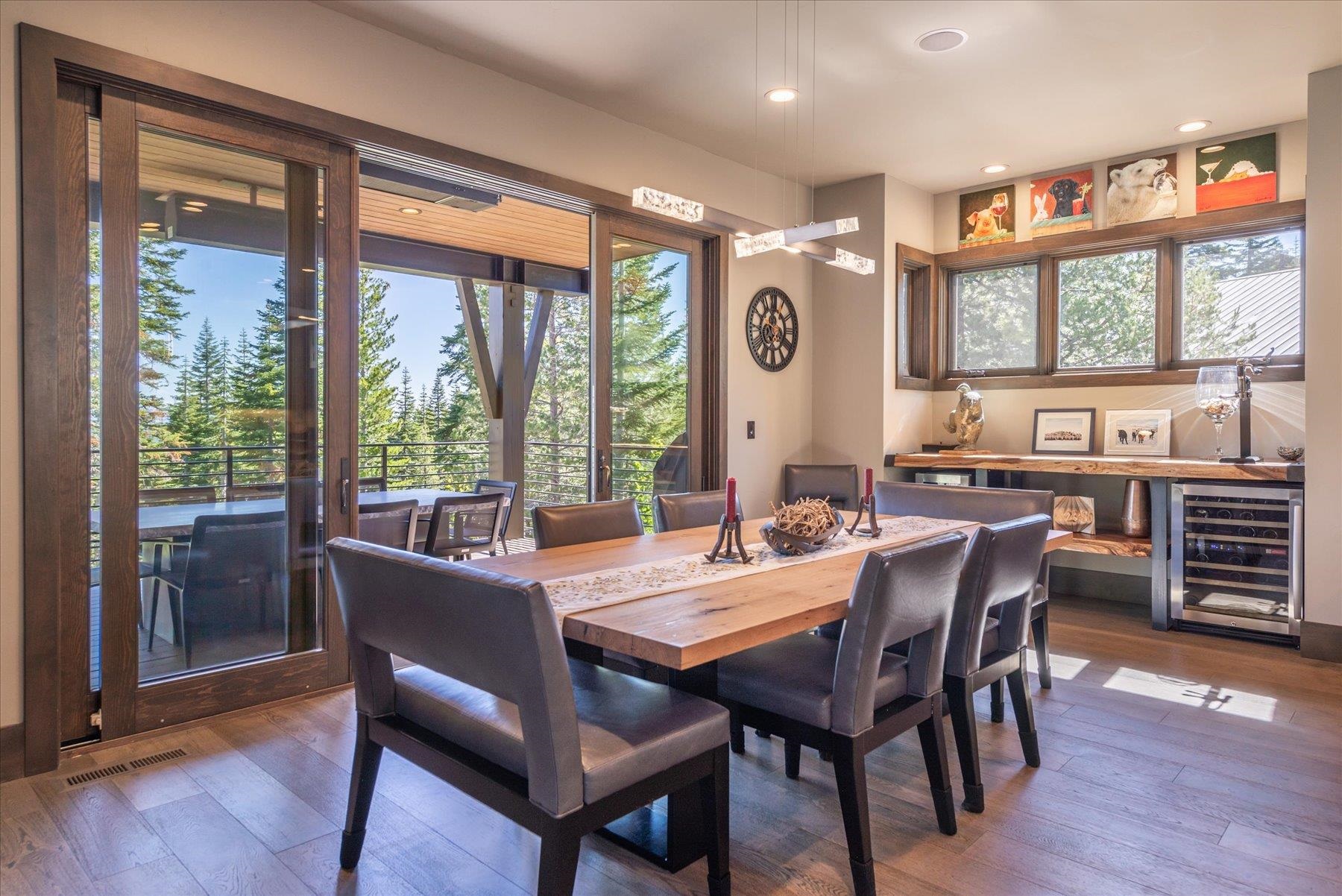 15339 Ski Slope Way Truckee, CA 96161 - Photo 8 of 28 a view of a dining room with furniture window and wooden floor