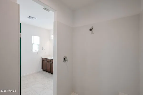 a view of a livingroom and a bathroom