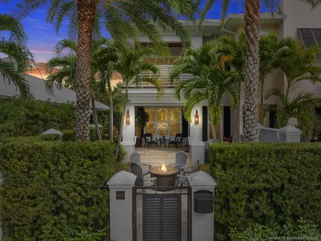 a front view of a house with balcony