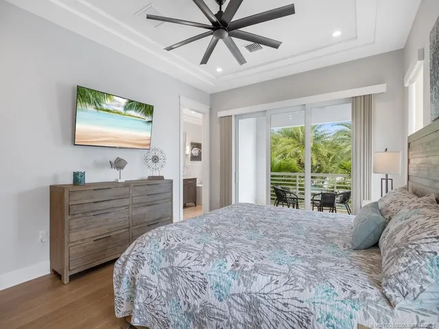 a bed room with a bed and a window