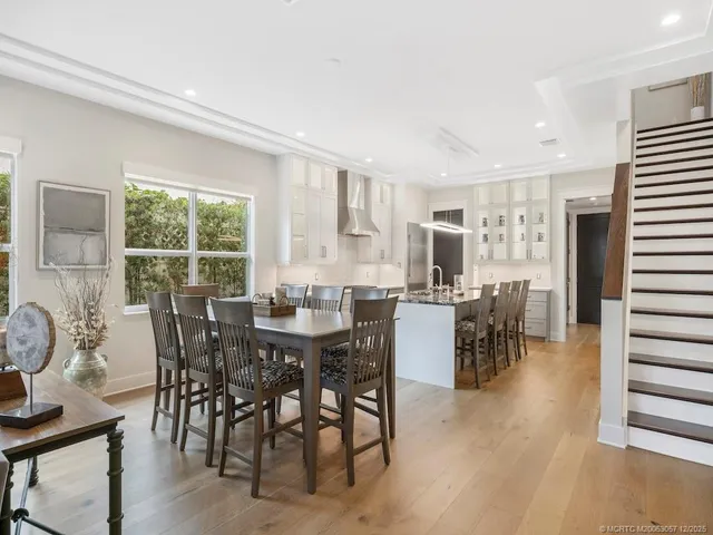 a view of a a dining room with furniture window and outside view
