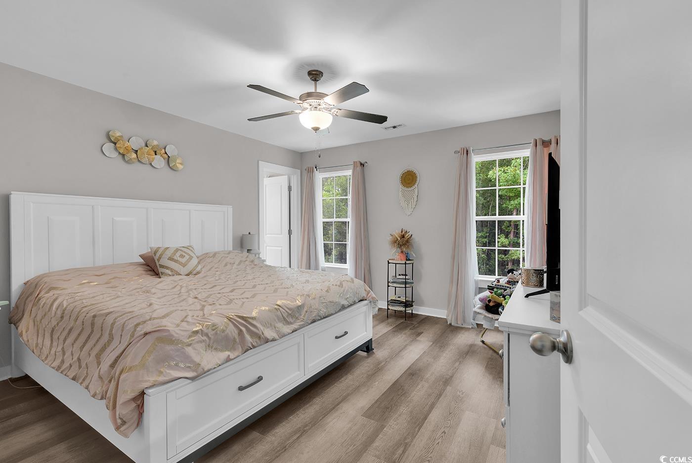 1517 Ackerrose Drive Conway, SC 29527 - Photo 12 of 33 Bedroom featuring light wood-type flooring and ceiling fan