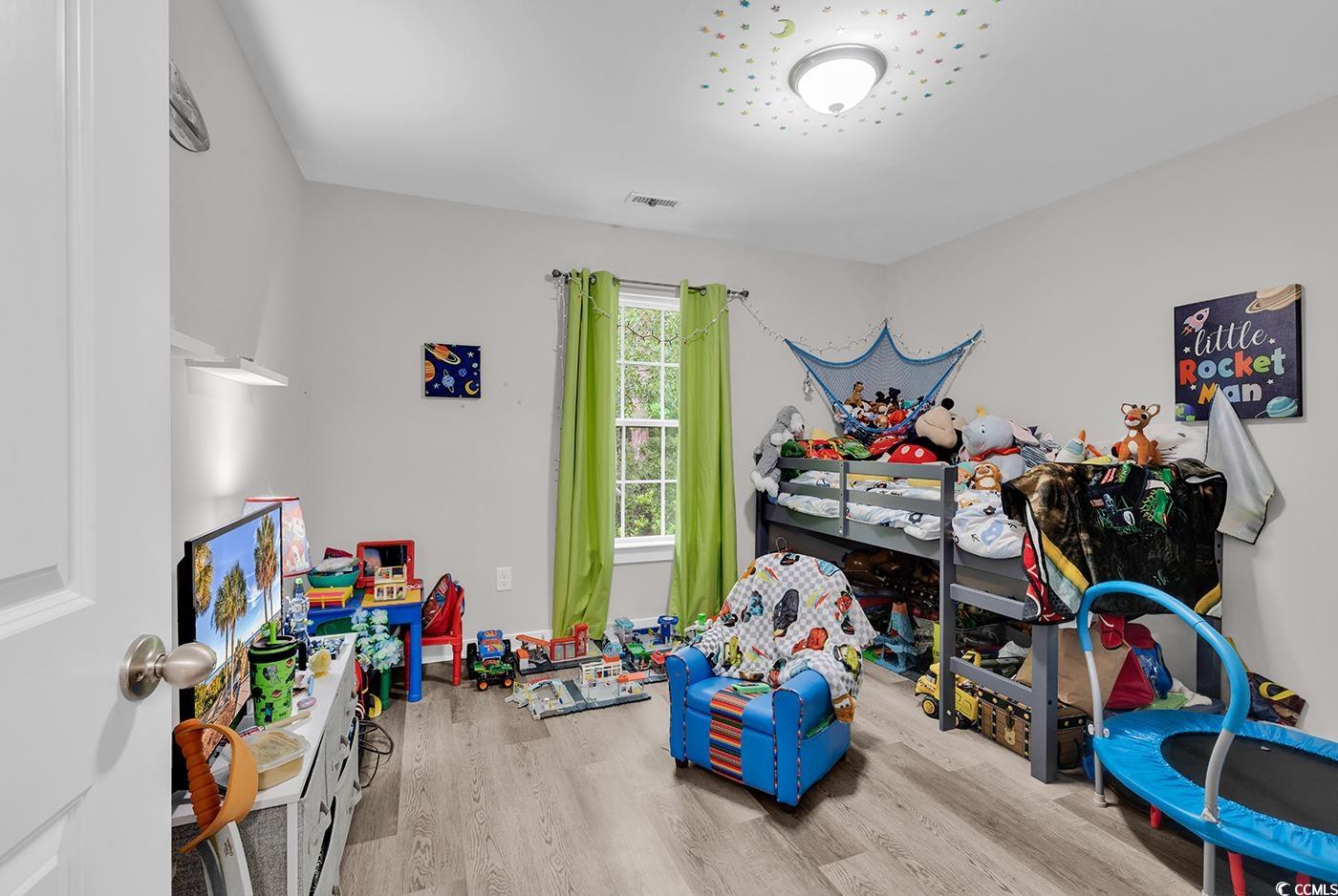 1517 Ackerrose Drive Conway, SC 29527 - Photo 18 of 33 Bedroom with wood finished floors