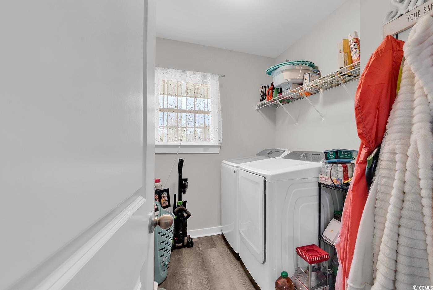 1517 Ackerrose Drive Conway, SC 29527 - Photo 21 of 33 Laundry room featuring light wood-type flooring and separate washer and dryer