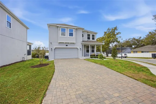 a house view with a garden space