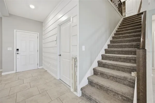 a view of an entryway with staircase