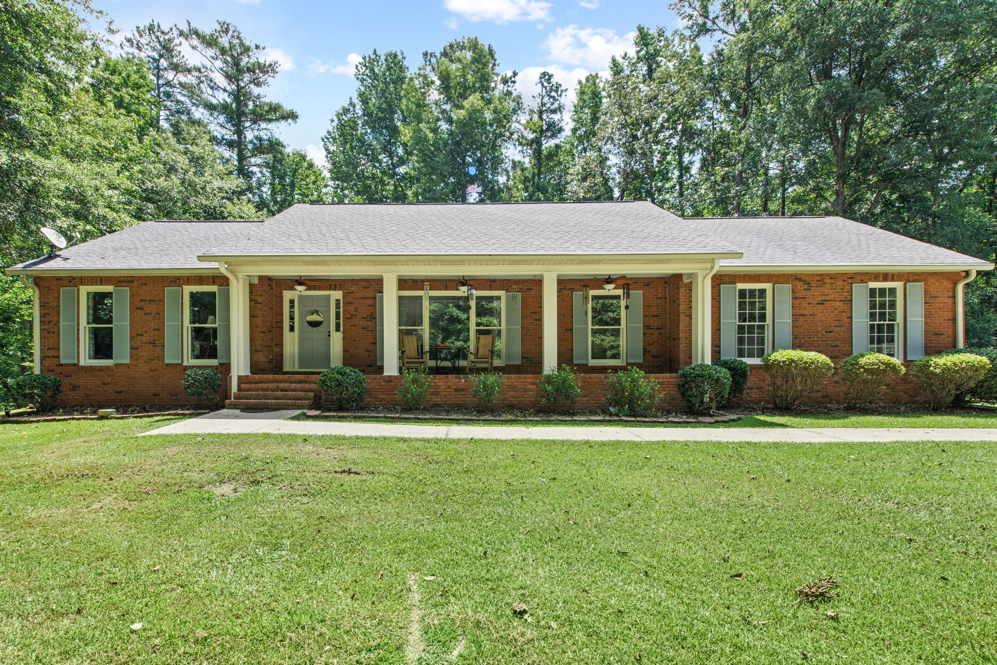 633 Walt Carmichael Road Newnan, GA 30263 - Photo 1 of 1 a front view of a house with a yard