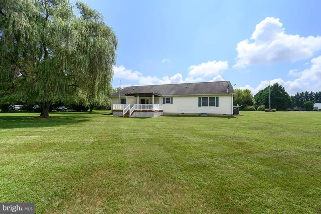 a view of a house with a big yard
