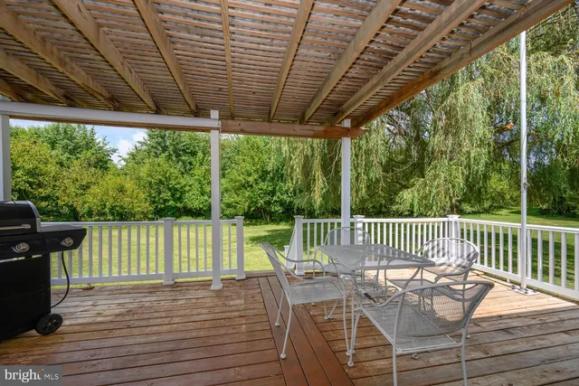 a view of balcony with furniture