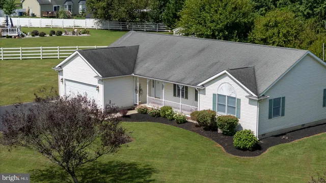 a view of house with garden