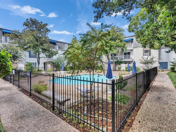 a view of street from balcony