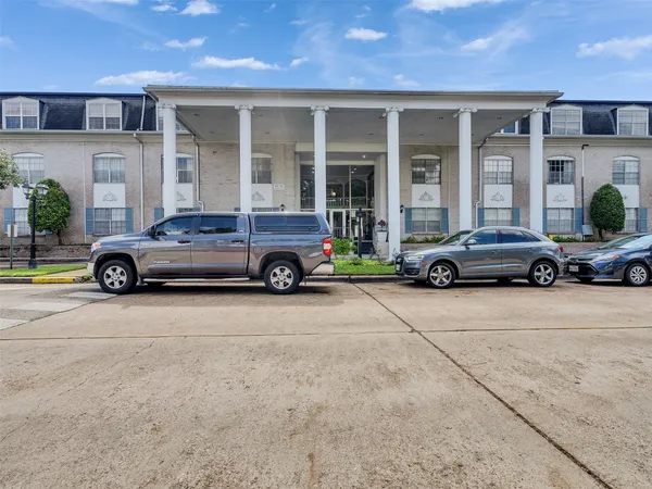 a car parked in front of a building