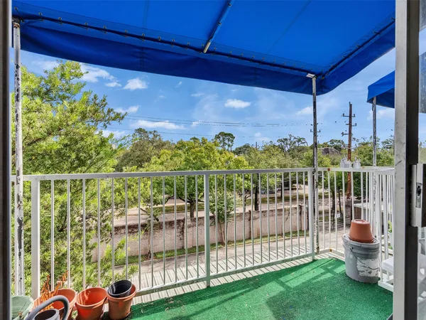 a view of a balcony with lake view