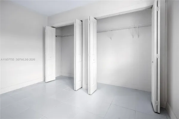 a view of entryway with washer and dryer