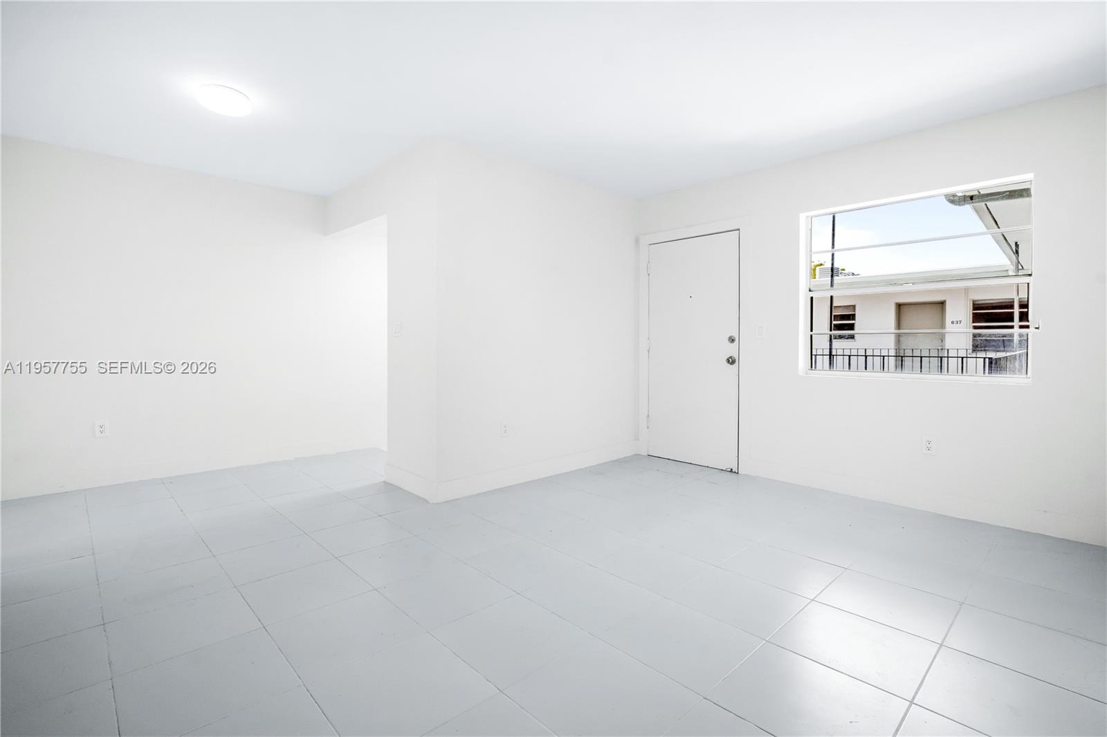 10375-35-55 Southwest 40th Street Miami, FL 33165 - Photo 3 of 13 a view of an empty room