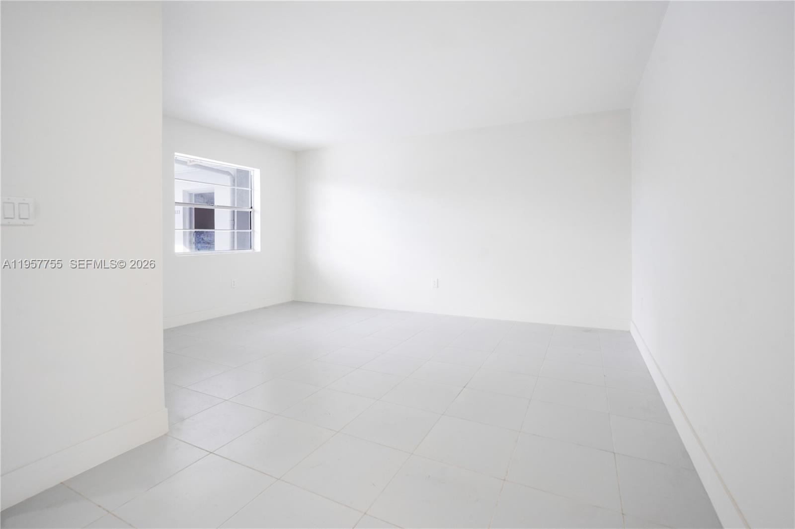 10375-35-55 Southwest 40th Street Miami, FL 33165 - Photo 4 of 13 a view of an empty room