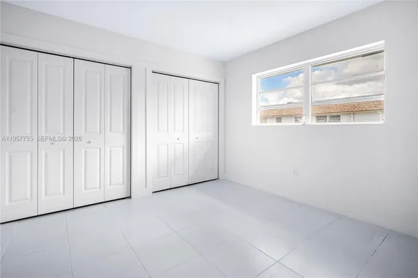 an empty room with a window