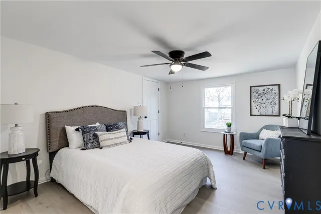 a bedroom with a bed and furniture