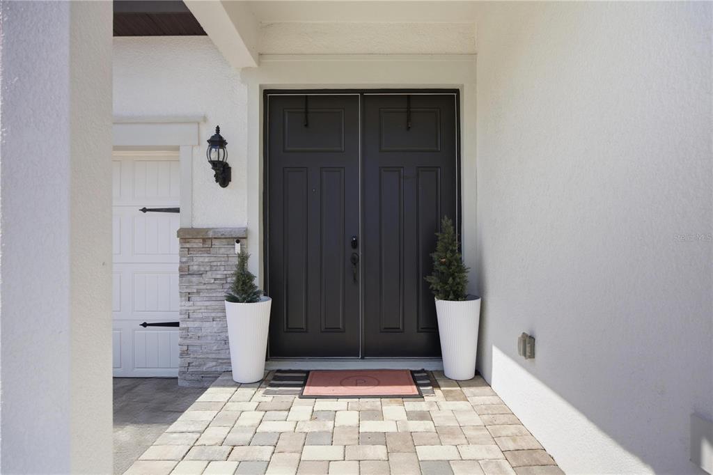 13816 Sharp Hawk Drive Riverview, FL 33569 - Photo 5 of 76 a view of an entrance door of the house