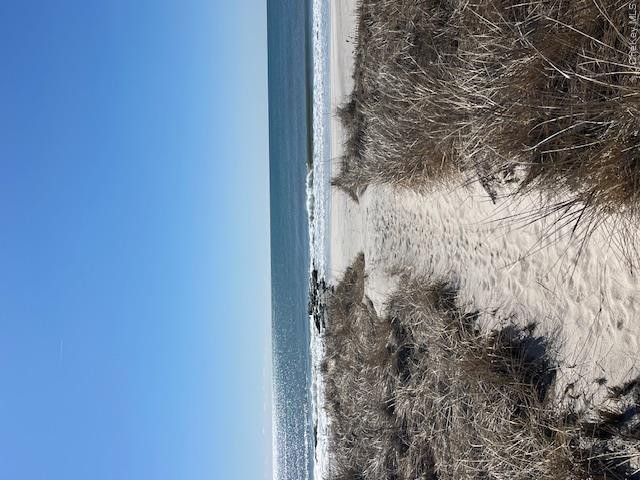 580 Dune Road, Unit 3 Westhampton Beach, NY 11978 - Photo 36 of 36 a view of an ocean beach
