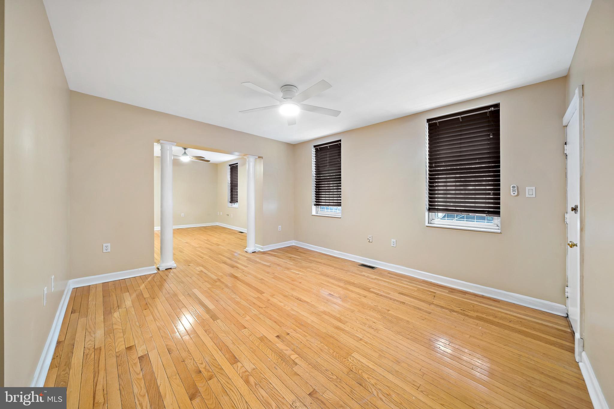 926 East Passyunk Avenue, Unit 1 Philadelphia, PA 19147 - Photo 11 of 19 a view of empty room with wooden floor and fan