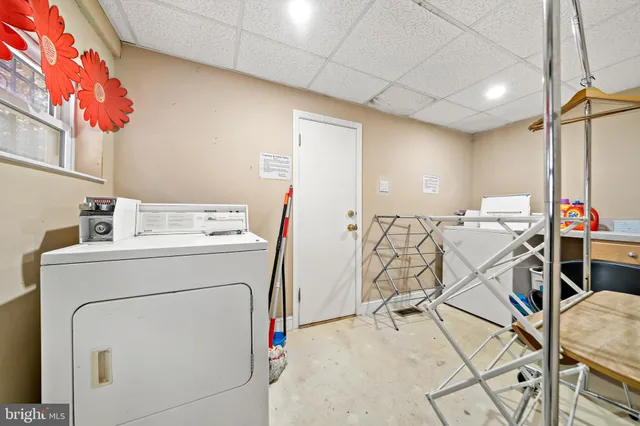 a storage room with washer and dryer