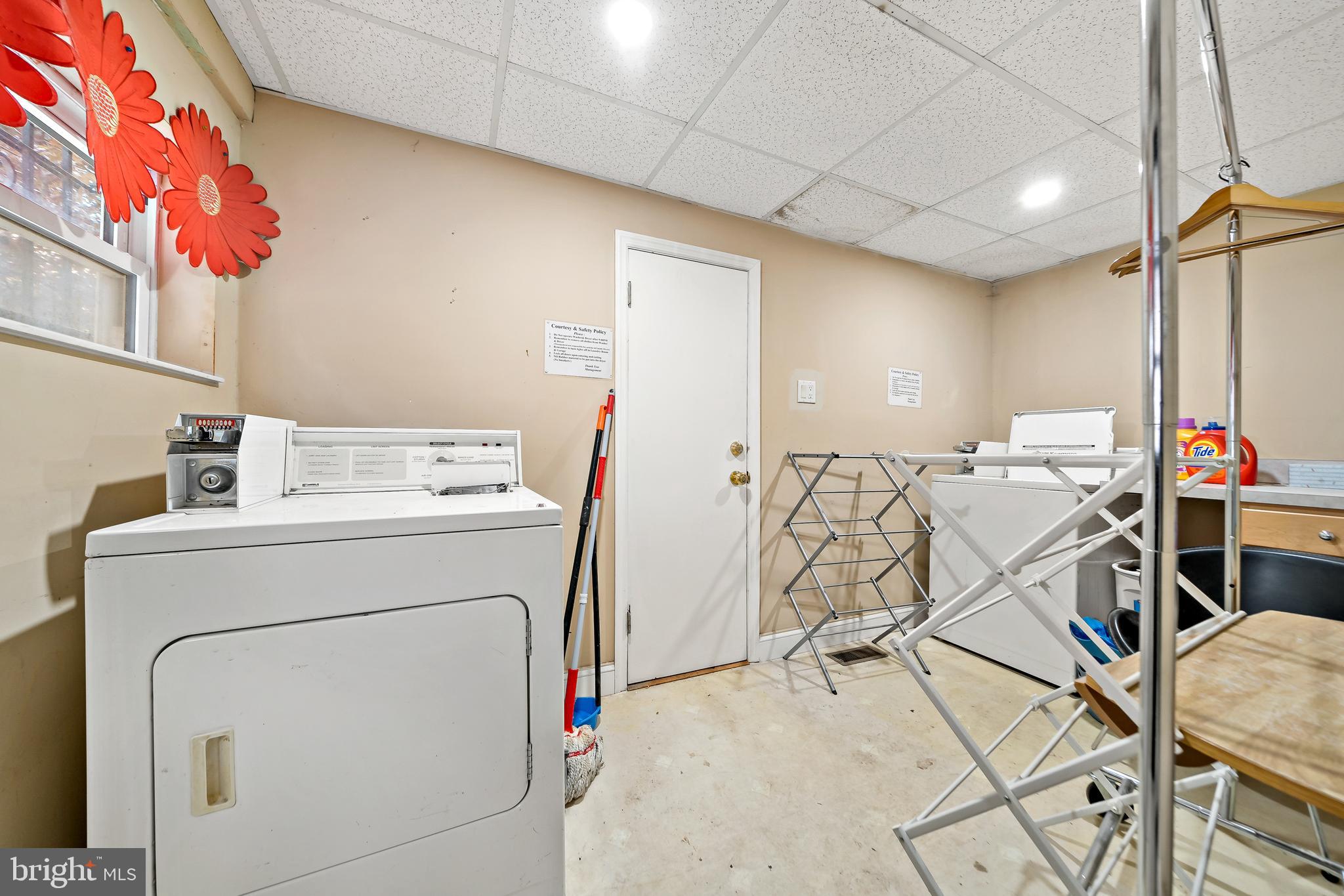 926 East Passyunk Avenue, Unit 1 Philadelphia, PA 19147 - Photo 14 of 19 a storage room with washer and dryer