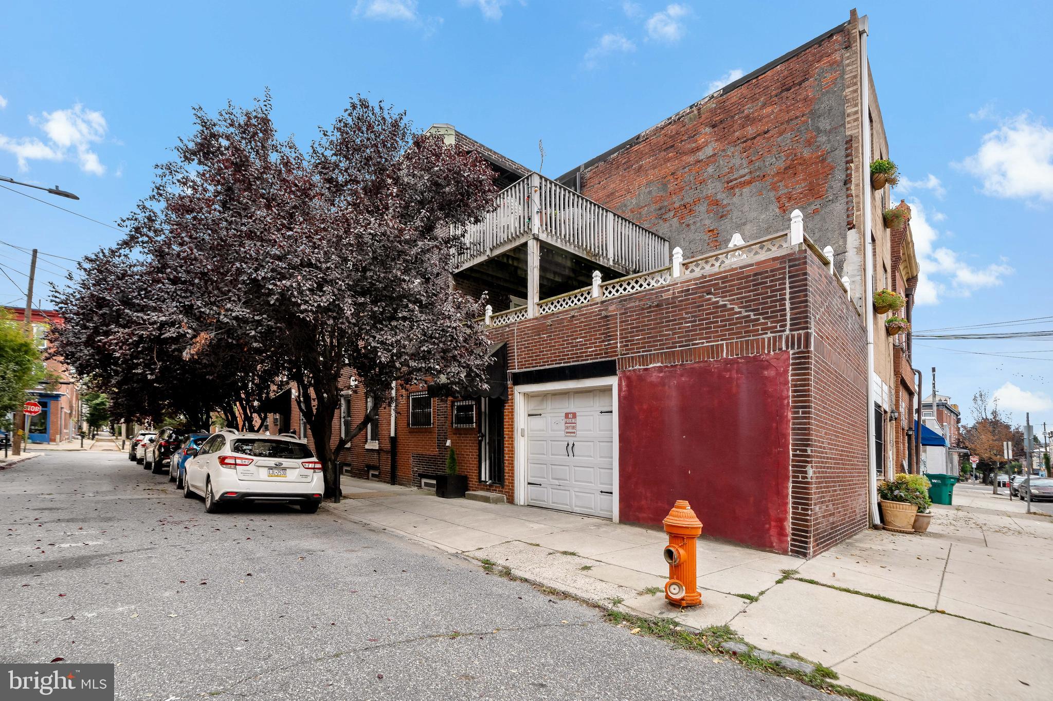 926 East Passyunk Avenue, Unit 1 Philadelphia, PA 19147 - Photo 18 of 19 a car parked in front of a house