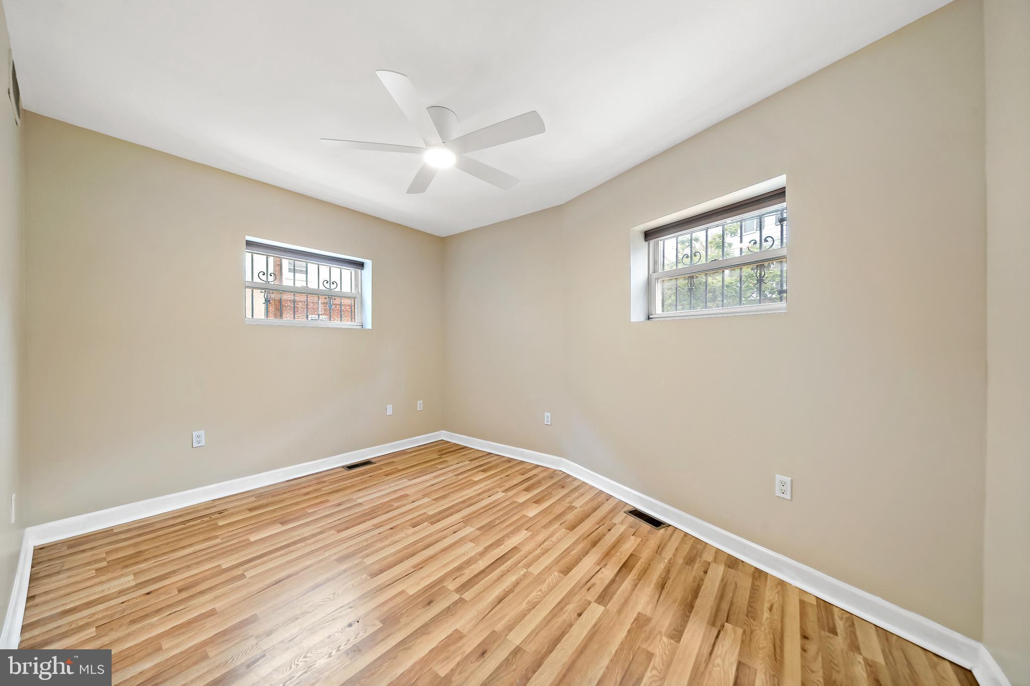 926 East Passyunk Avenue, Unit 1 Philadelphia, PA 19147 - Photo 5 of 19 a view of empty room with wooden floor