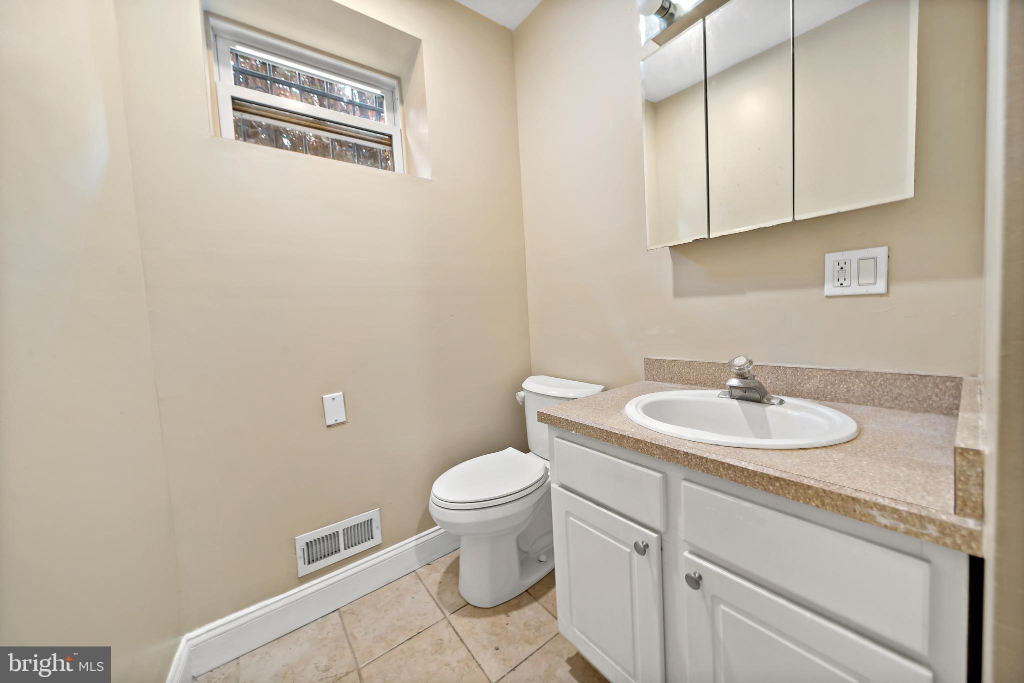 926 East Passyunk Avenue, Unit 1 Philadelphia, PA 19147 - Photo 10 of 19 a bathroom with a sink and a toilet
