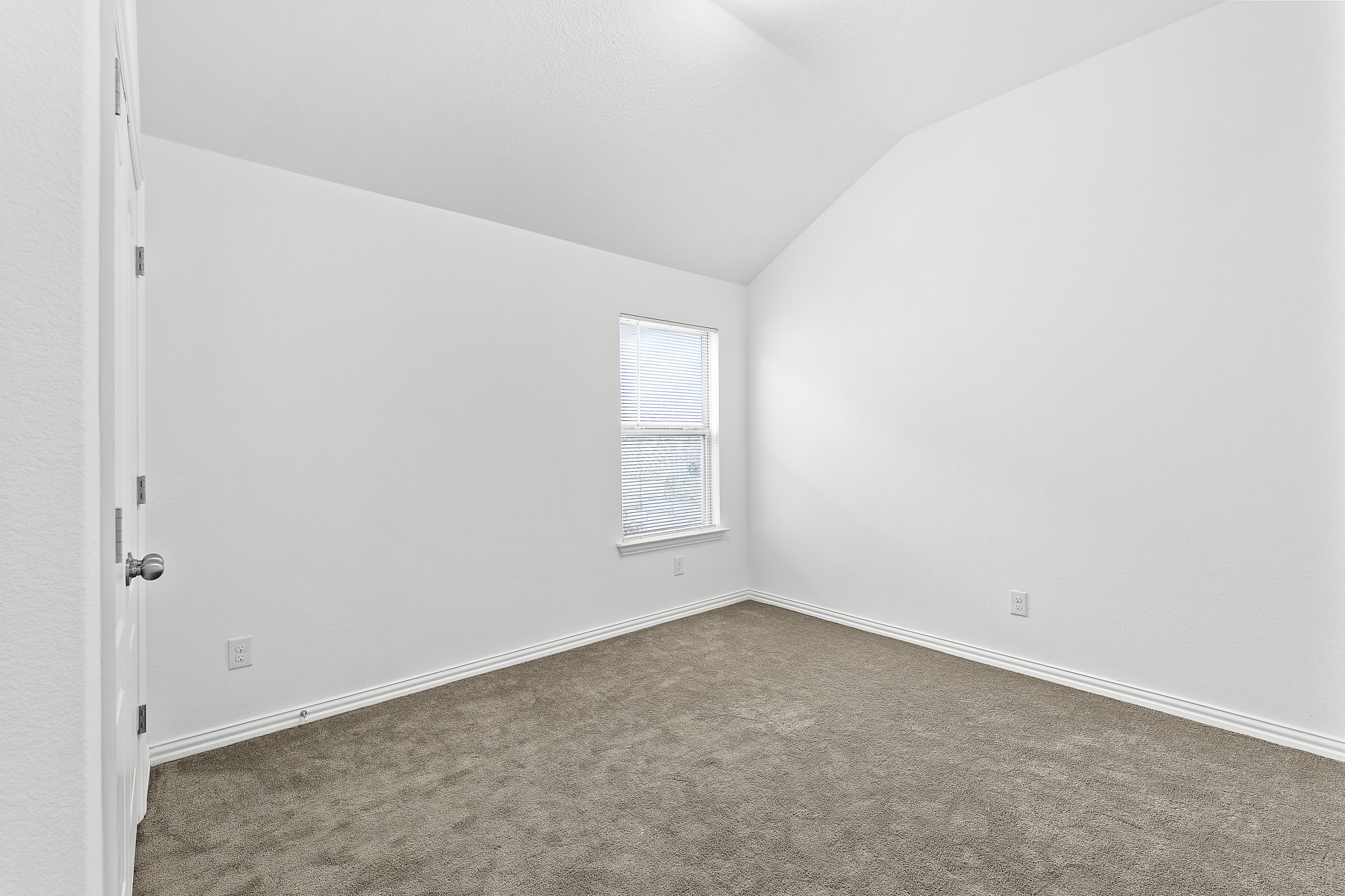 489 Cherrystone Loop Buda, TX 78610 - Photo 12 of 21 an empty room with a window
