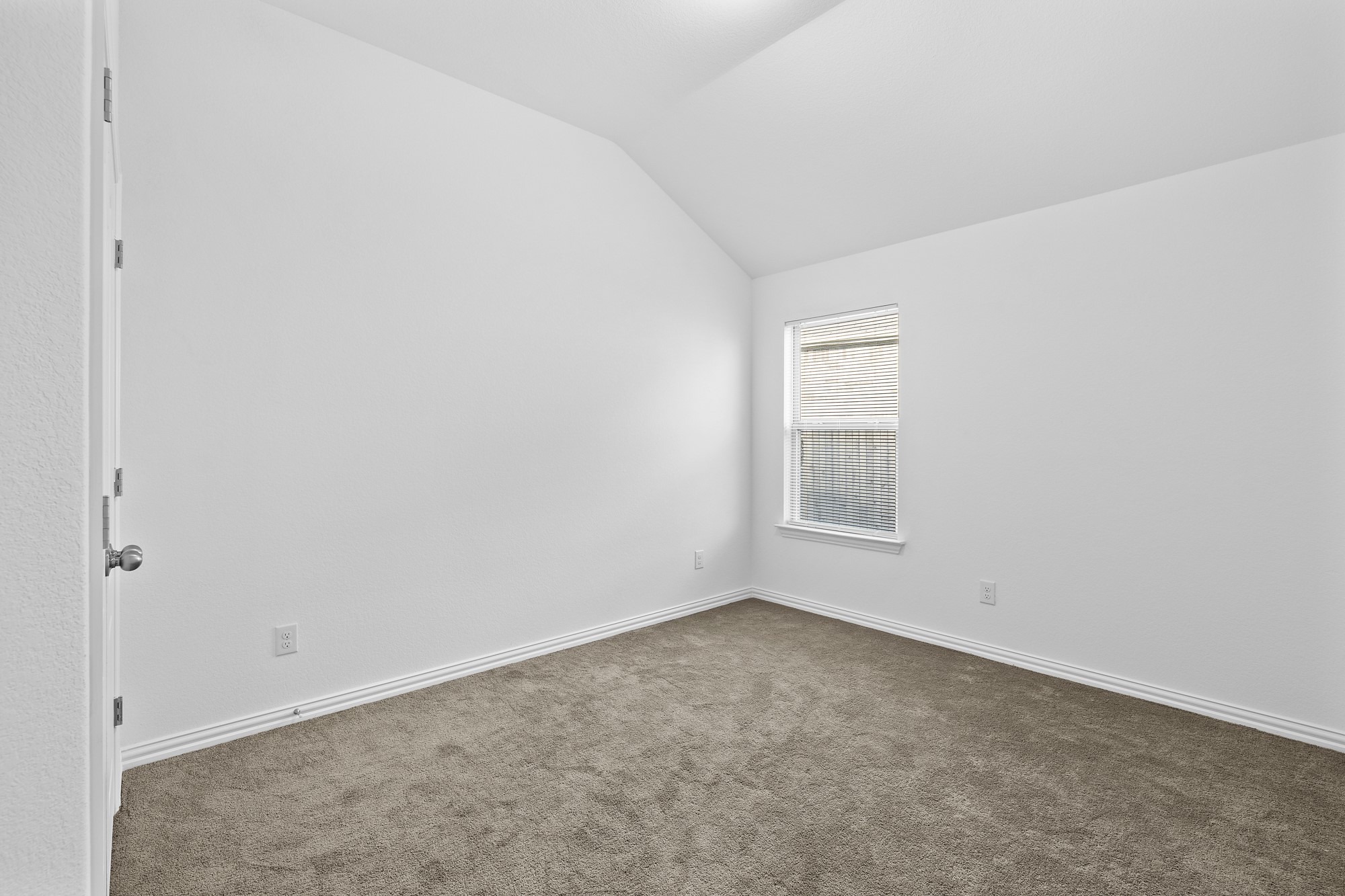 489 Cherrystone Loop Buda, TX 78610 - Photo 14 of 21 a view of an empty room with a window