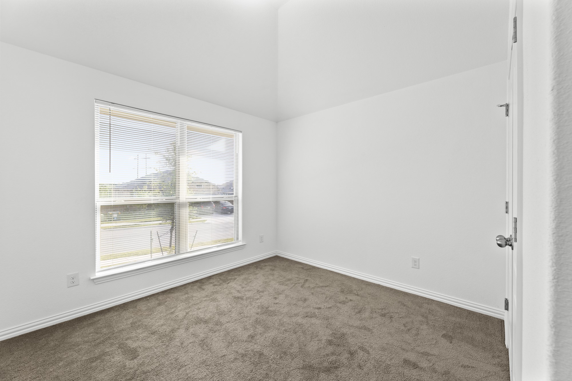 489 Cherrystone Loop Buda, TX 78610 - Photo 15 of 21 an empty room with a window
