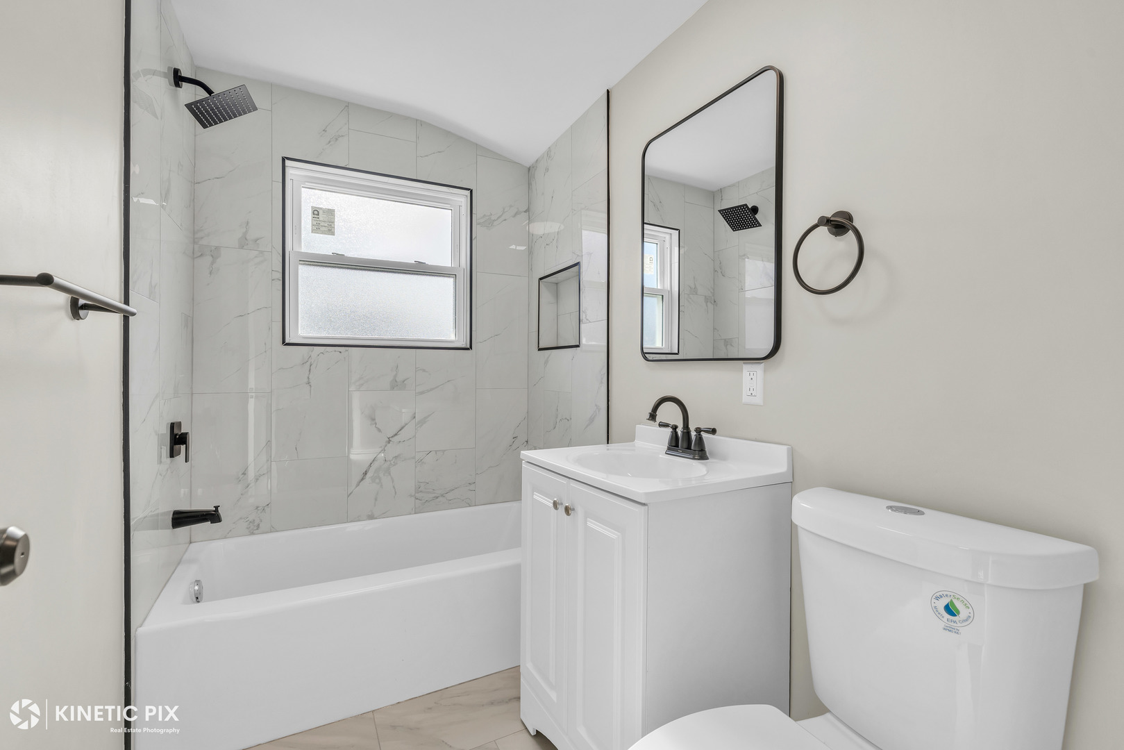 11011 Roosevelt Road Westchester, IL 60154 - Photo 21 of 40 a bathroom with a toilet sink and mirror