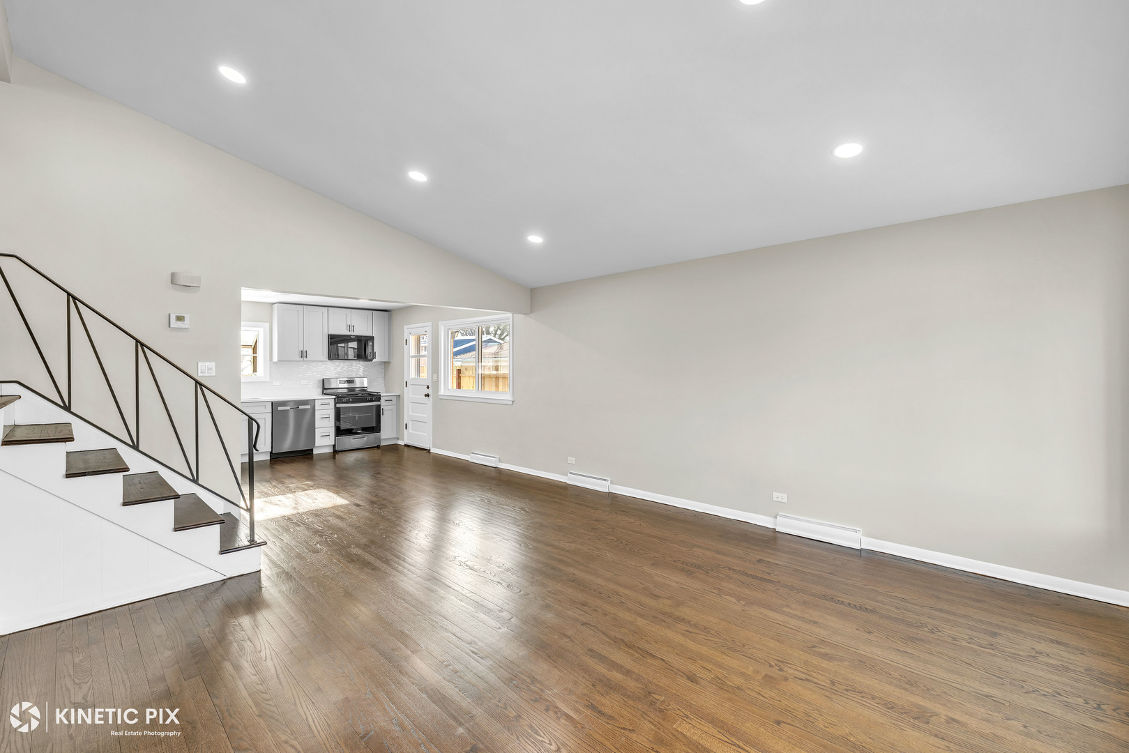 11011 Roosevelt Road Westchester, IL 60154 - Photo 5 of 40 a view of livingroom with hardwood floor and workspace