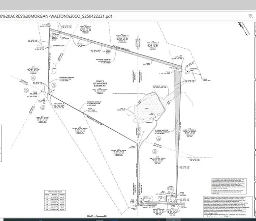 a picture of a room with a bench and white walls