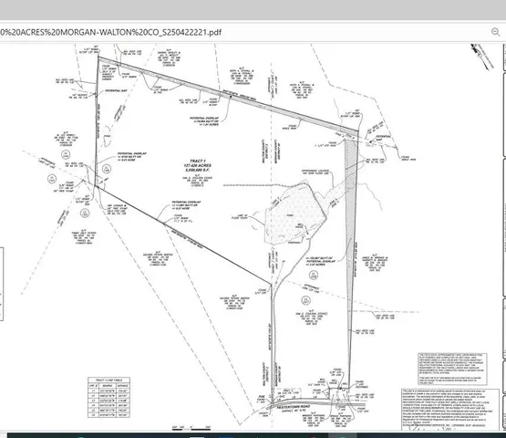 a picture of a room with a bench and white walls