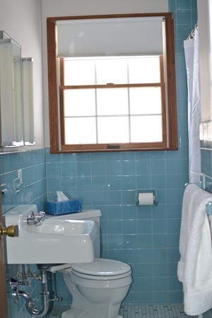 110 Boston Post Road Wayland, MA 01778 - Photo 13 of 20 a bathroom with a sink a toilet and a window