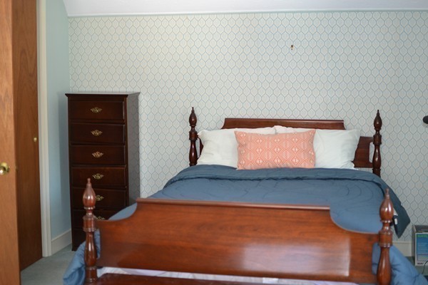 110 Boston Post Road Wayland, MA 01778 - Photo 14 of 20 a bedroom with a bed and dresser