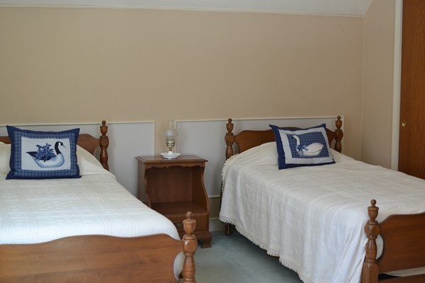 110 Boston Post Road Wayland, MA 01778 - Photo 17 of 20 a bedroom with a bed and window