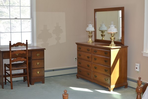110 Boston Post Road Wayland, MA 01778 - Photo 18 of 20 a room with a dresser and a mirror