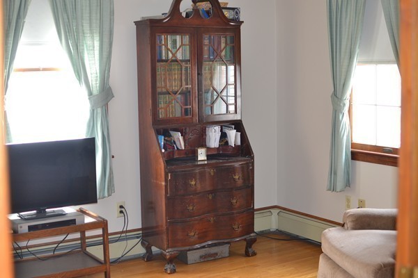 110 Boston Post Road Wayland, MA 01778 - Photo 8 of 20 a living room with furniture and a window