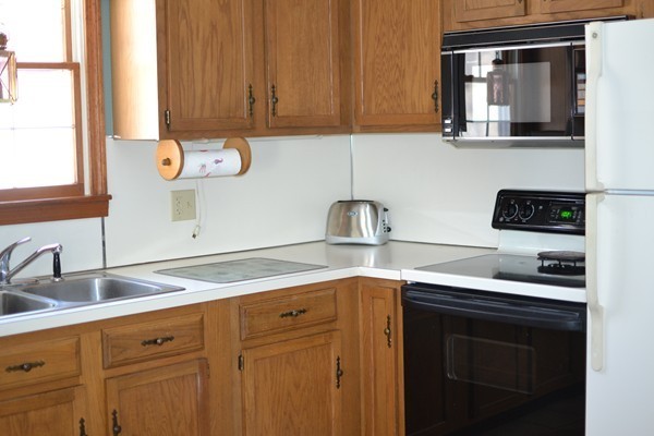 110 Boston Post Road Wayland, MA 01778 - Photo 10 of 20 a kitchen with a sink and cabinets