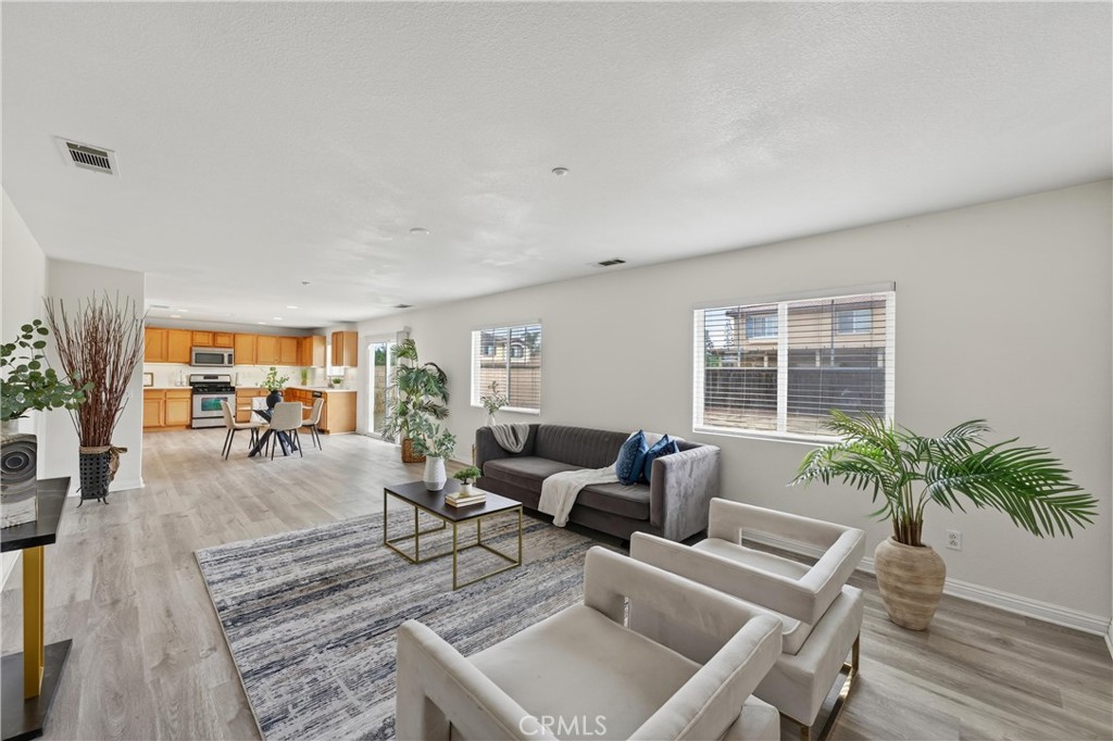 9406 Kentfield Court Riverside, CA 92508 - Photo 14 of 64 Perfect flow from the family room to the kitchen