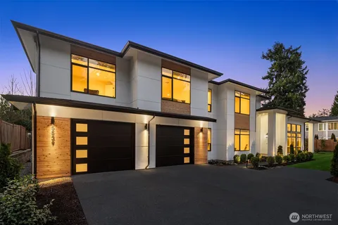 a front view of a house with garage