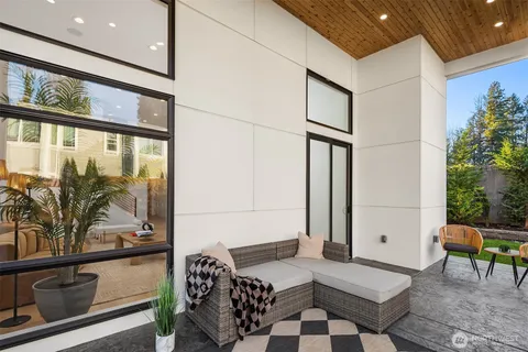 a bedroom with furniture and window