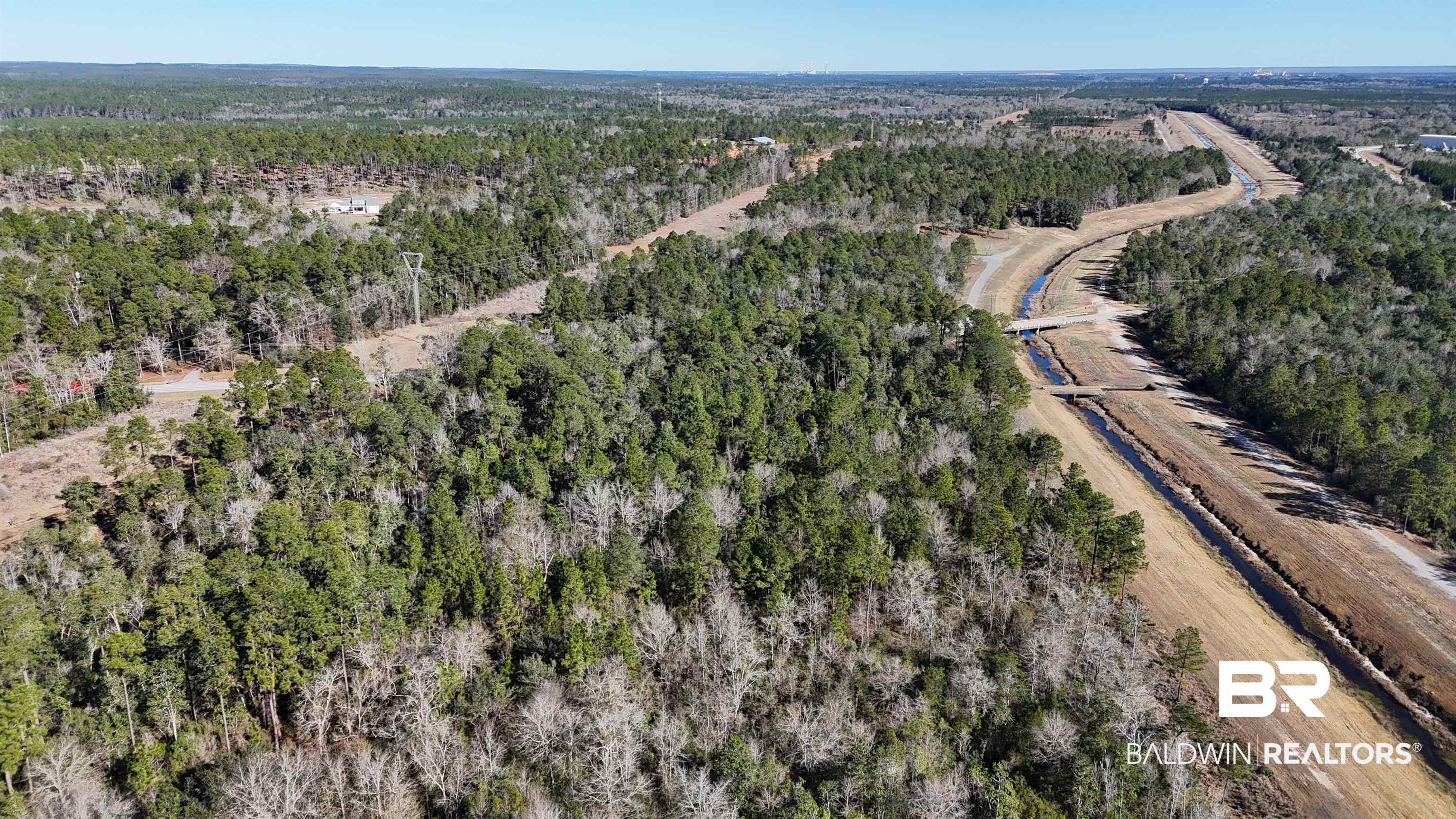 0 Radcliff Road Saraland, AL 36571 - Photo 7 of 14 Aerial view of property's location with a heavily wooded area